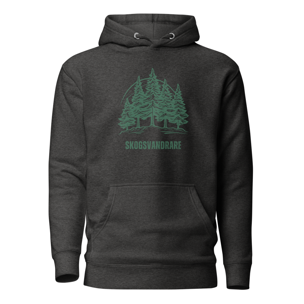 Mörkgråmelerad unisex hoodie med ett grönt granmotiv och texten “Skogsvandrare” tryckt på framsidan.
Charcoal heather unisex hoodie with a green pine tree design and the text “Skogsvandrare” printed on the front.