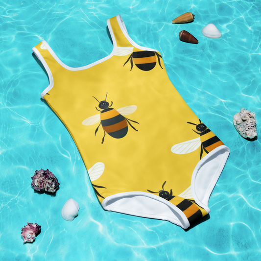 Barnbaddräkt i gult med stora tryckta bin – yellow kids swimsuit with cute bee print