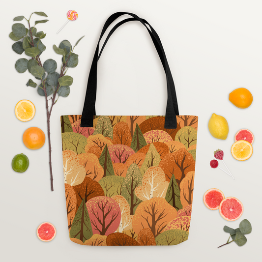 Polyester-tygväska med svart handtag och mönster av stiliserade träd i höstens färger – orange, rött, gult och grönt.
Polyester tote bag with black handle and a stylized pattern of autumn-colored trees in orange, red, yellow, and green.