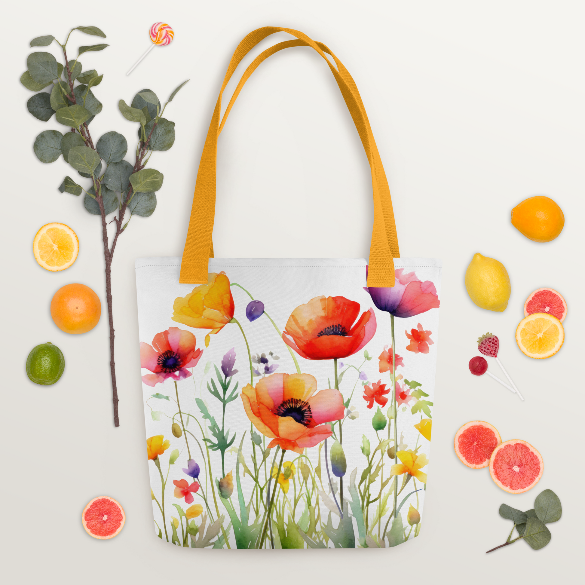 Polyester-tygväska med gult handtag och färgglatt mönster av akvarellmålade ängsblommor på vit botten.
Polyester tote bag with yellow handle and colorful watercolor-style meadow flowers printed on a white background.