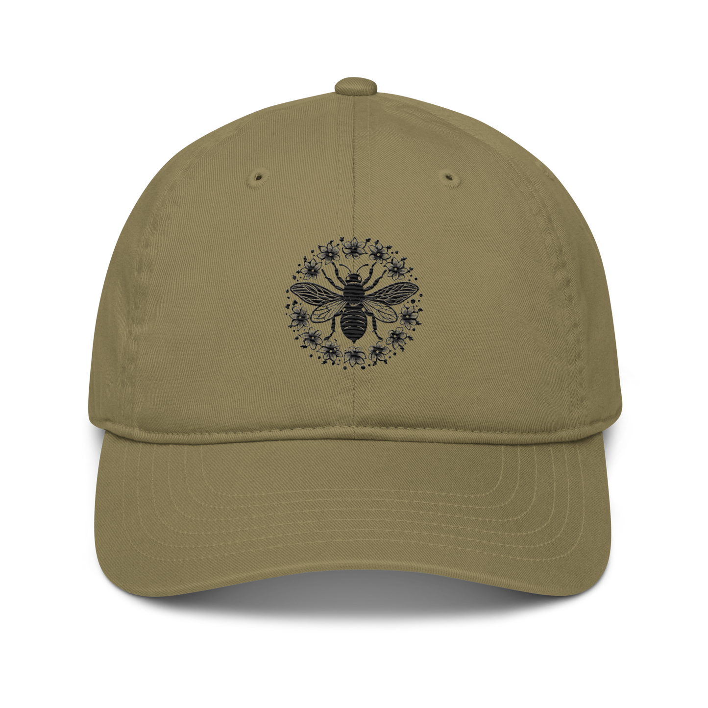 Ekologisk baseballkeps i färgen djungelgrön med broderat bimotiv i svart, föreställande en stor bi av små blommor i cirkelmönster på framsidan.
Organic jungle green baseball cap with a black embroidered bee design featuring a large central bee surrounded by flowers in a circular pattern on the front.