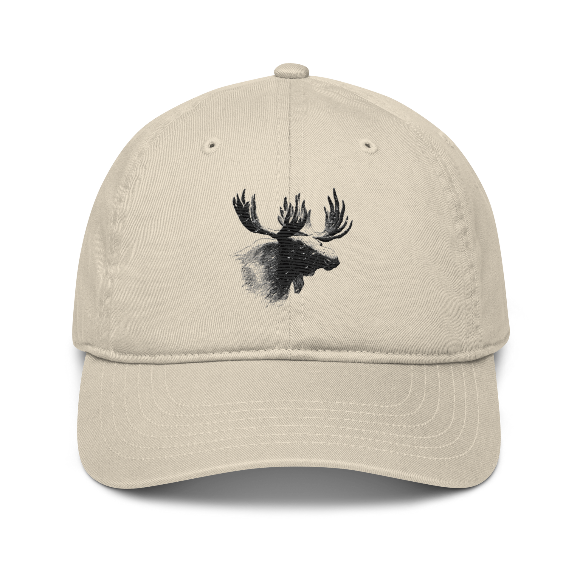 Ljusbeige ekologisk baseballkeps med ett broderat älghuvud i svart och grått på framsidan.
Oyster organic baseball cap with an embroidered moose head in black and gray on the front.