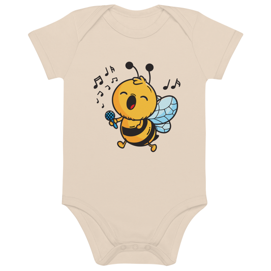 Ekologisk babybody i natur färg med tryck av ett sjungande bi.
Organic baby bodysuit in natural color with a singing bee print.