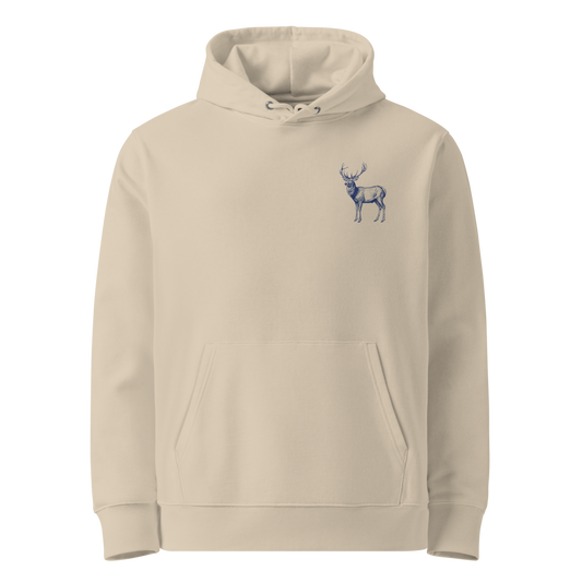 Framsida av sandfärgad unisex ekologisk hoodie med broderad hjort på bröstet.
Front view of sand-colored unisex organic hoodie with embroidered deer on the chest.