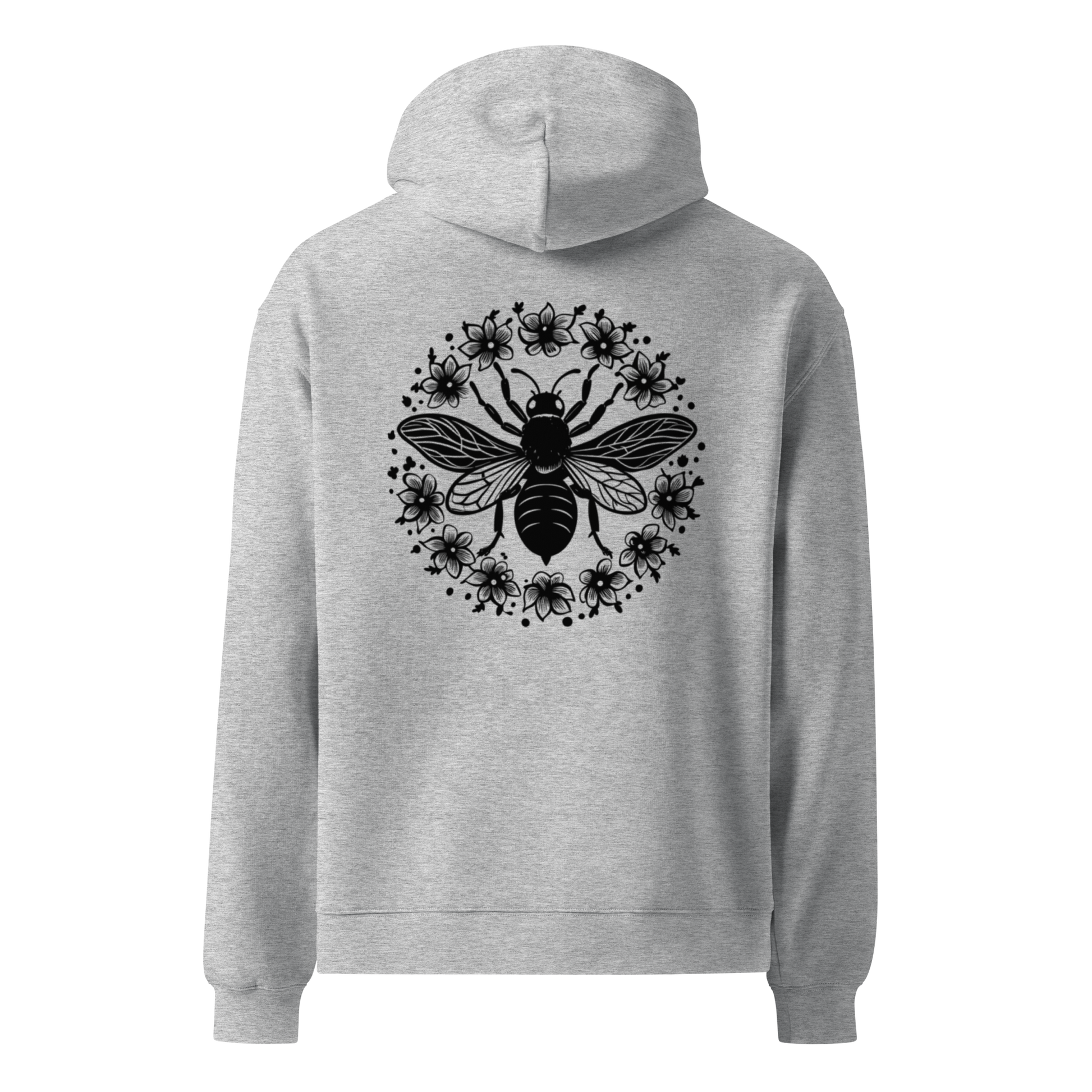 Unisex oversized hoodie i grått med ett stort bi- och blommotiv tryckt på ryggen, visad bakifrån.
Unisex oversized grey hoodie with a large bee and floral print on the back, shown from behind