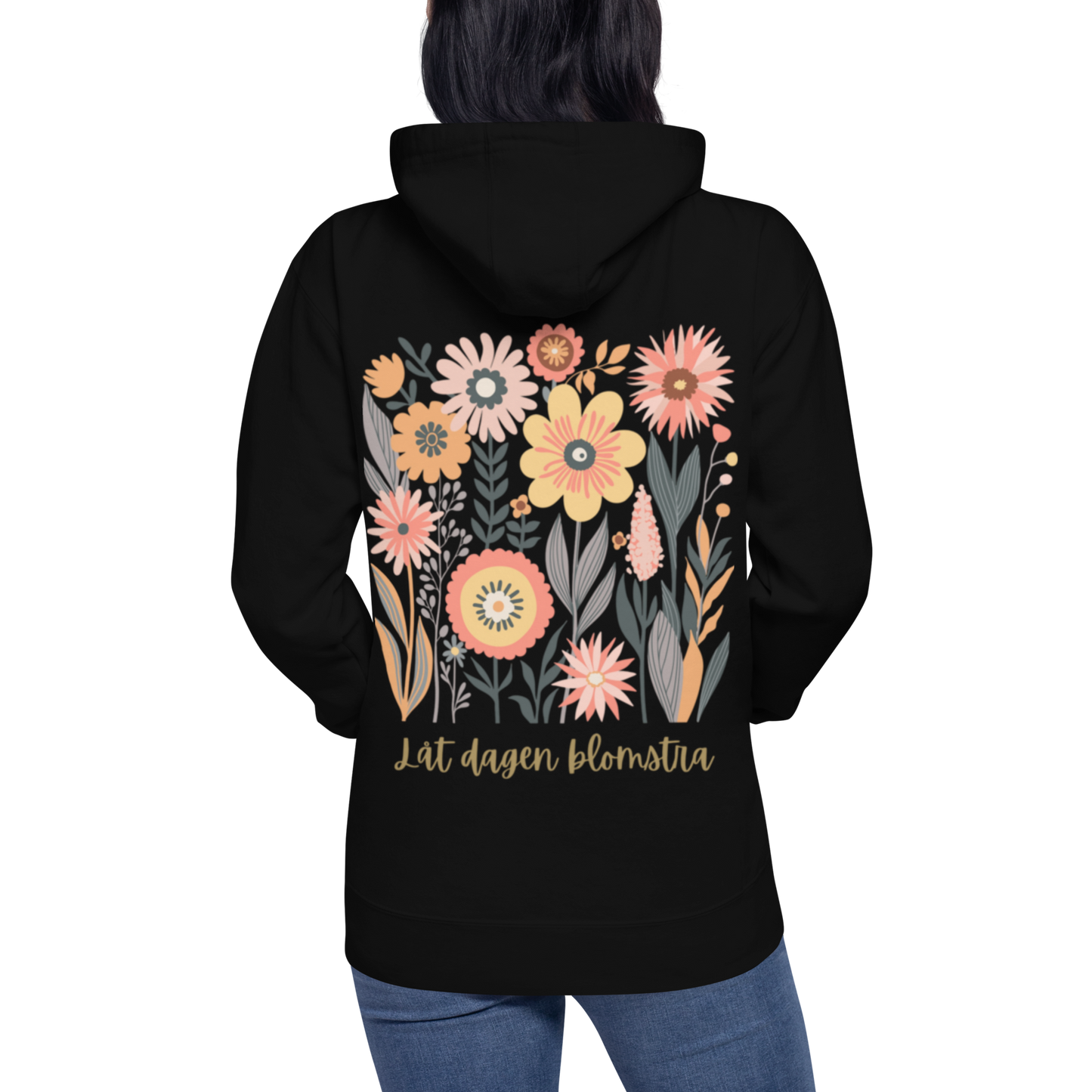 Svart unisex premium hoodie med färgglad blommotiv och texten "Låt dagen blomstra!". Black unisex premium hoodie with colorful floral motif and the text "Låt dagen blomstra!".