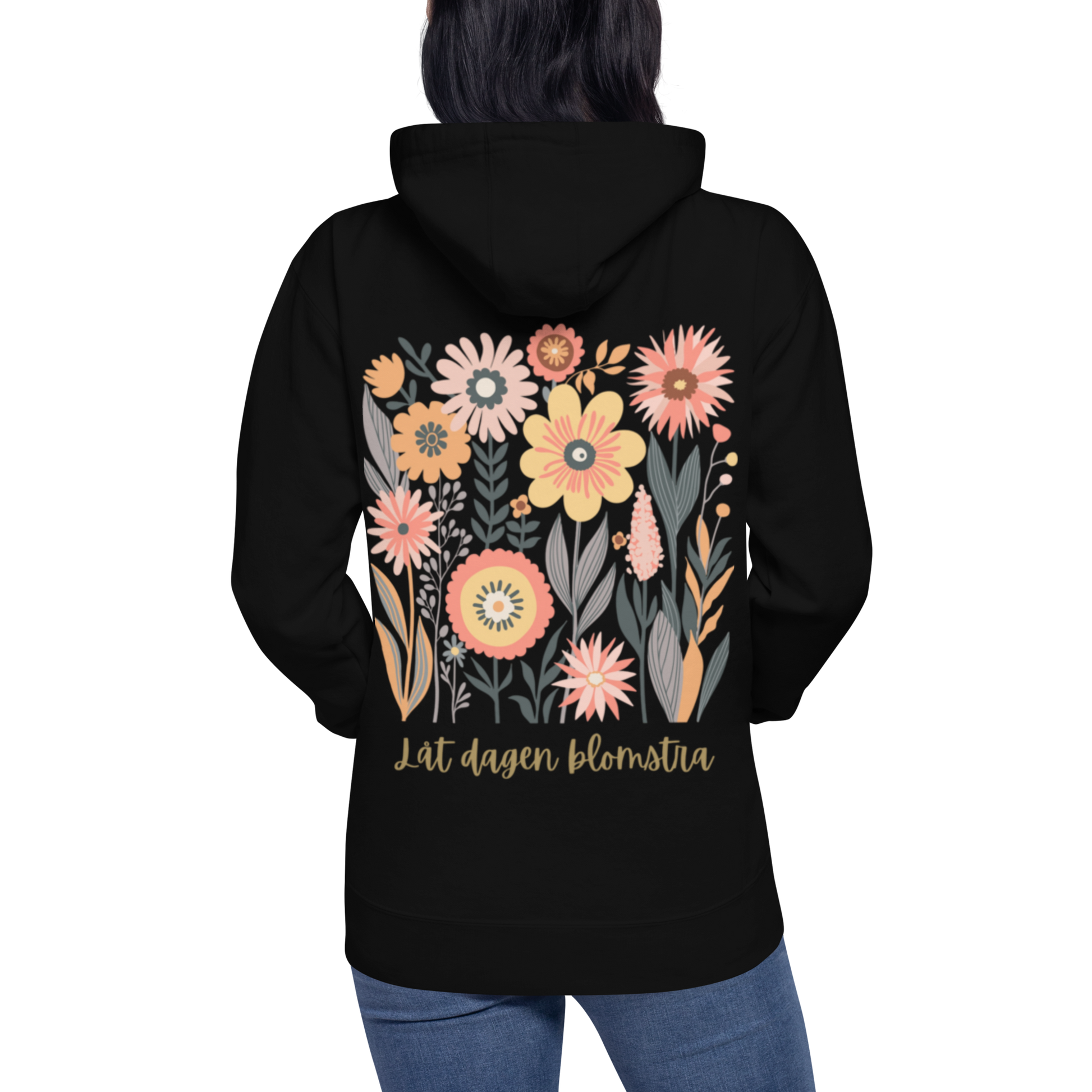 Svart unisex premium hoodie med färgglad blommotiv och texten "Låt dagen blomstra!". Black unisex premium hoodie with colorful floral motif and the text "Låt dagen blomstra!".